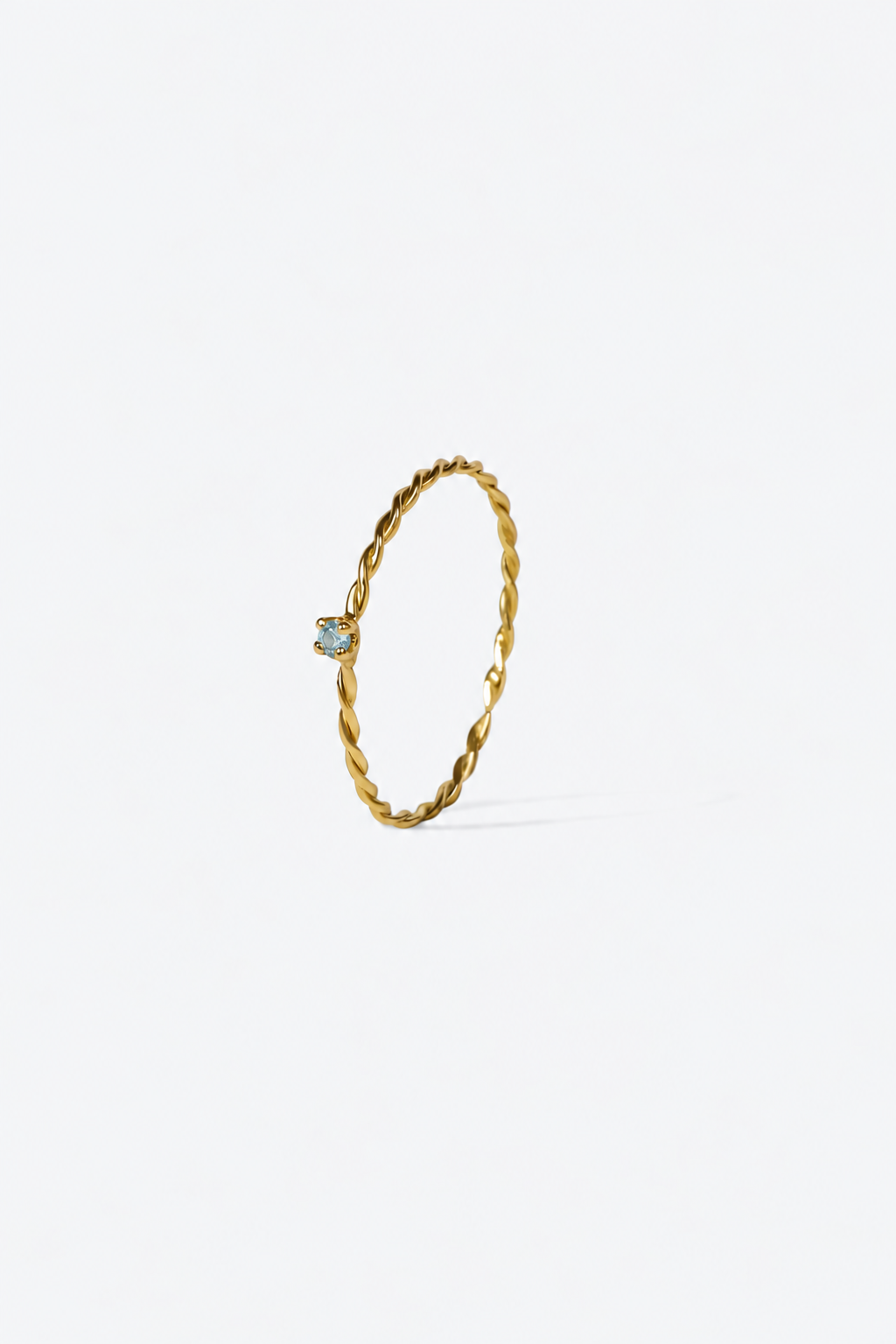 Bague Olympe or jaune torsadé sertie d'une aigue-marine