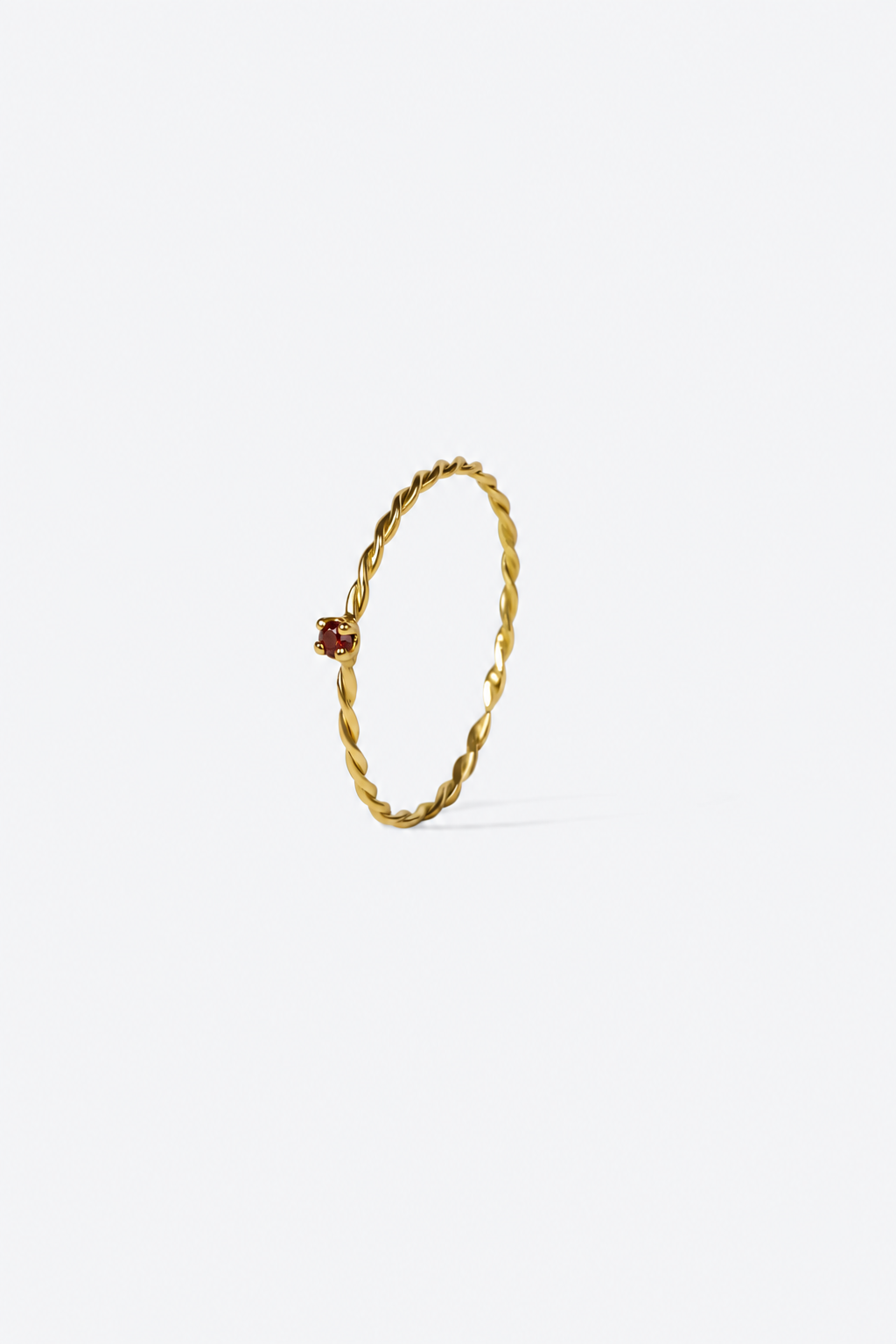 Bague Olympe or jaune torsadé sertie d'un grenat